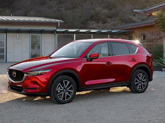 2019 CX5 pageii.jpg red 2019 mazda cx-5 outside in vero beach, south florida