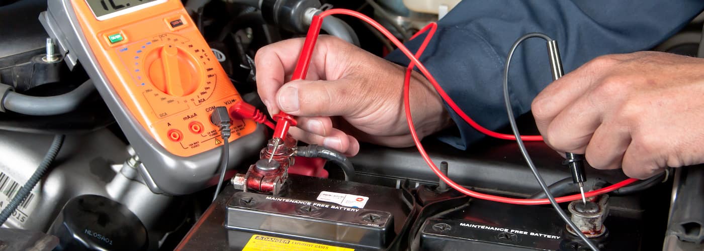 mechanic-checking-battery_745279.jpg