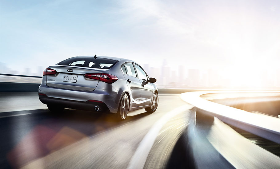 2014 KIA Forte Sedan Exterior Rear End Silver.jpg