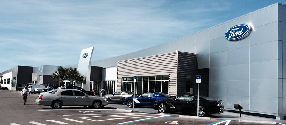 new building with vehicles.jpg