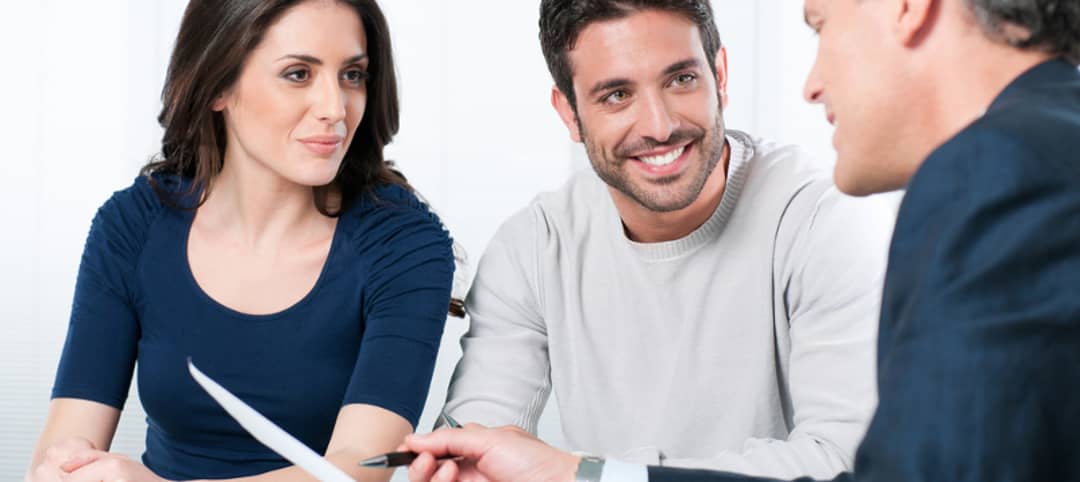 couple talking to finance guy