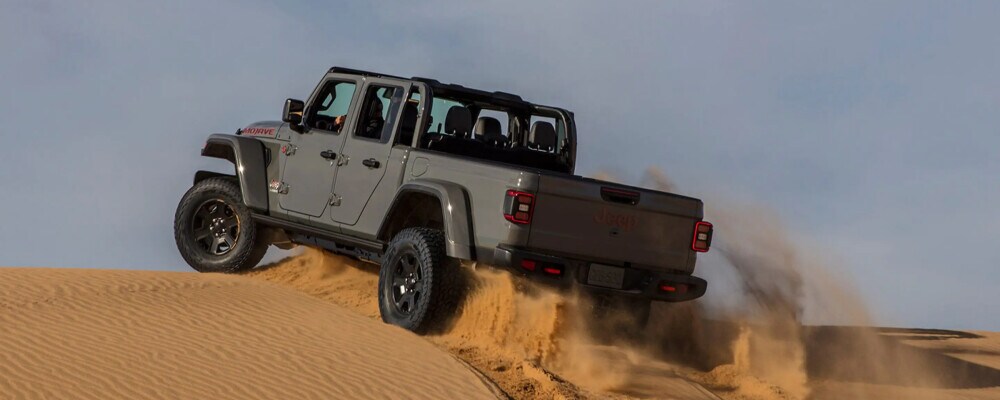 Jeep Gladiator driving through the desert