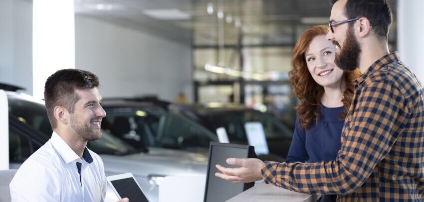 Customers at dealership.jpeg