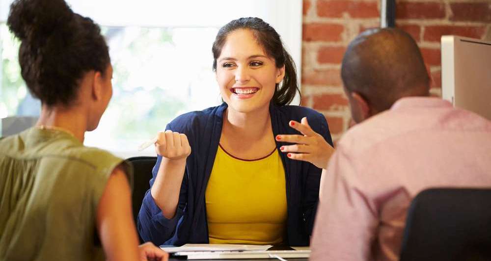 Couple Meeting With Finance Woman.jpg