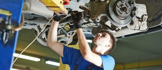 Auto mechanic working