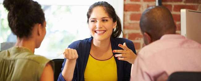 Couple Meeting With Finance Woman
