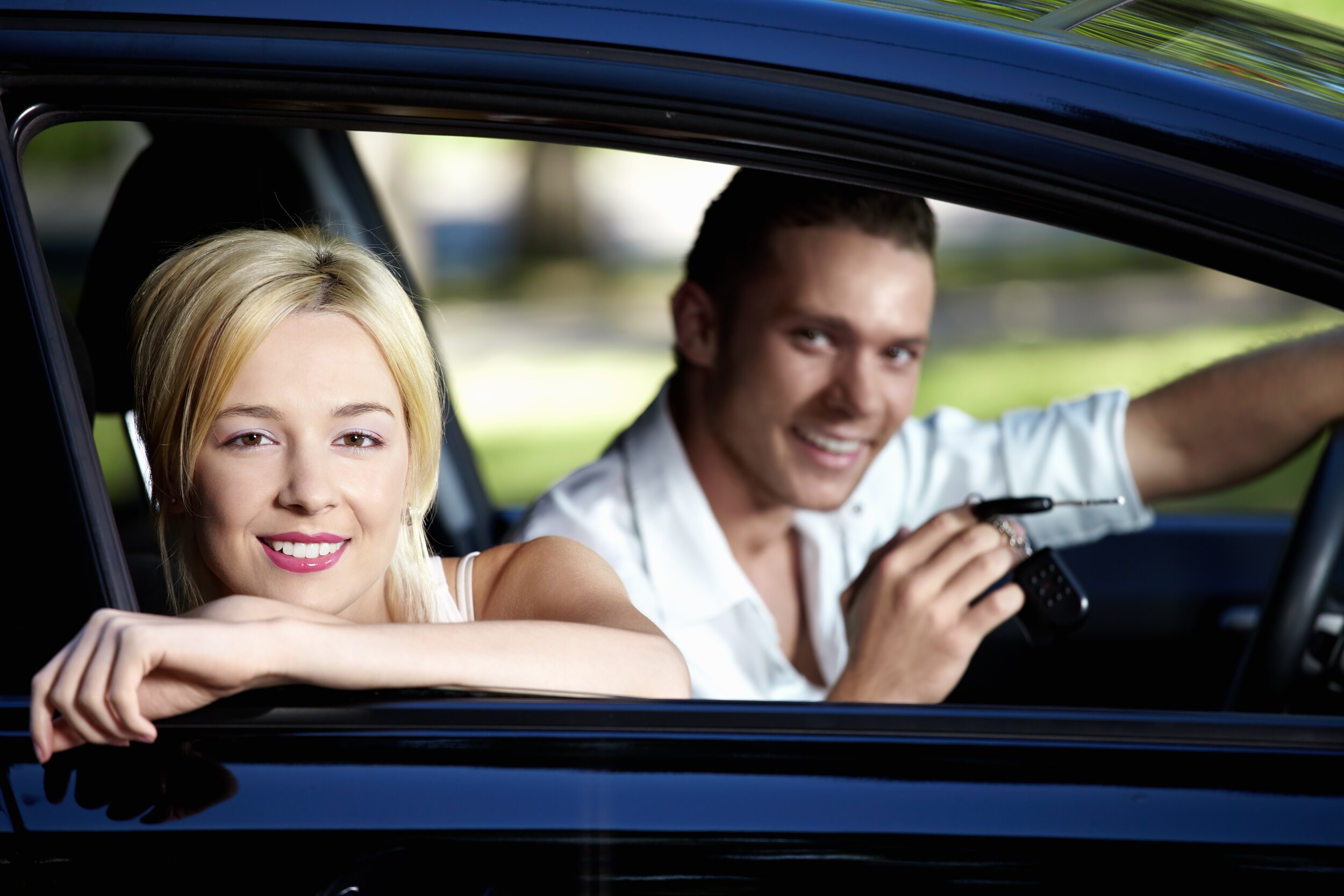couple in new car