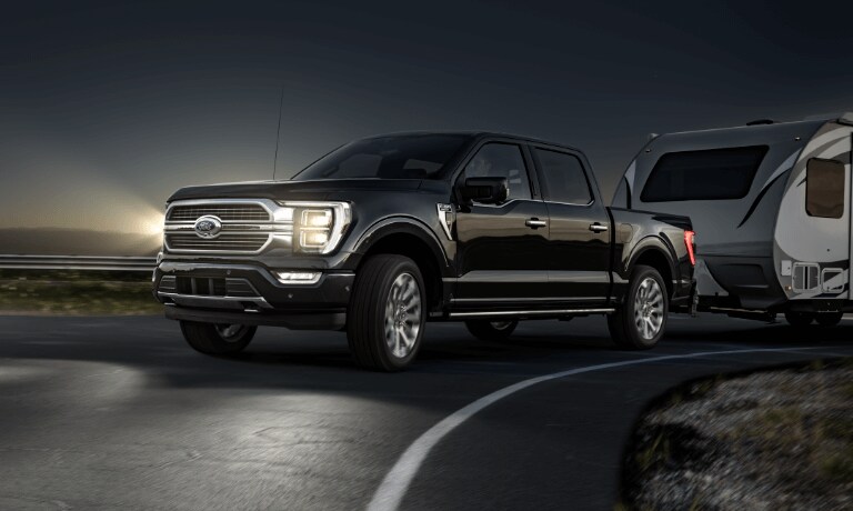 2021 Ford F150 Exterior Driving At Night While Pulling Camper