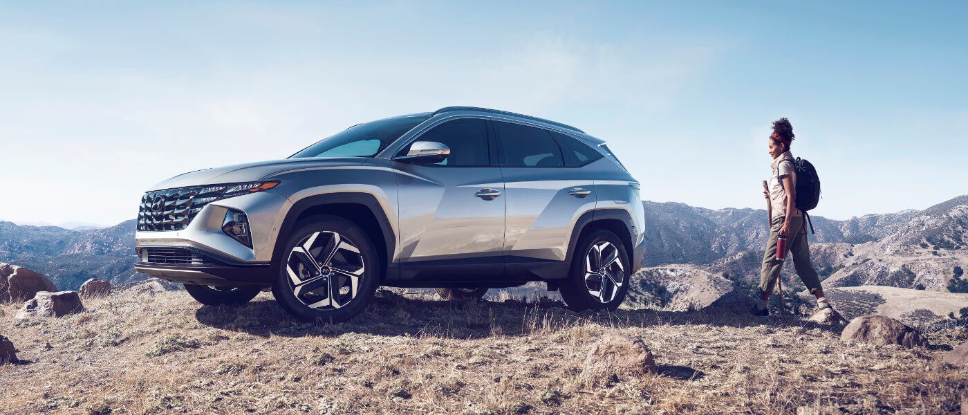 2022 Hyundai Tucson exterior off-road with hiker