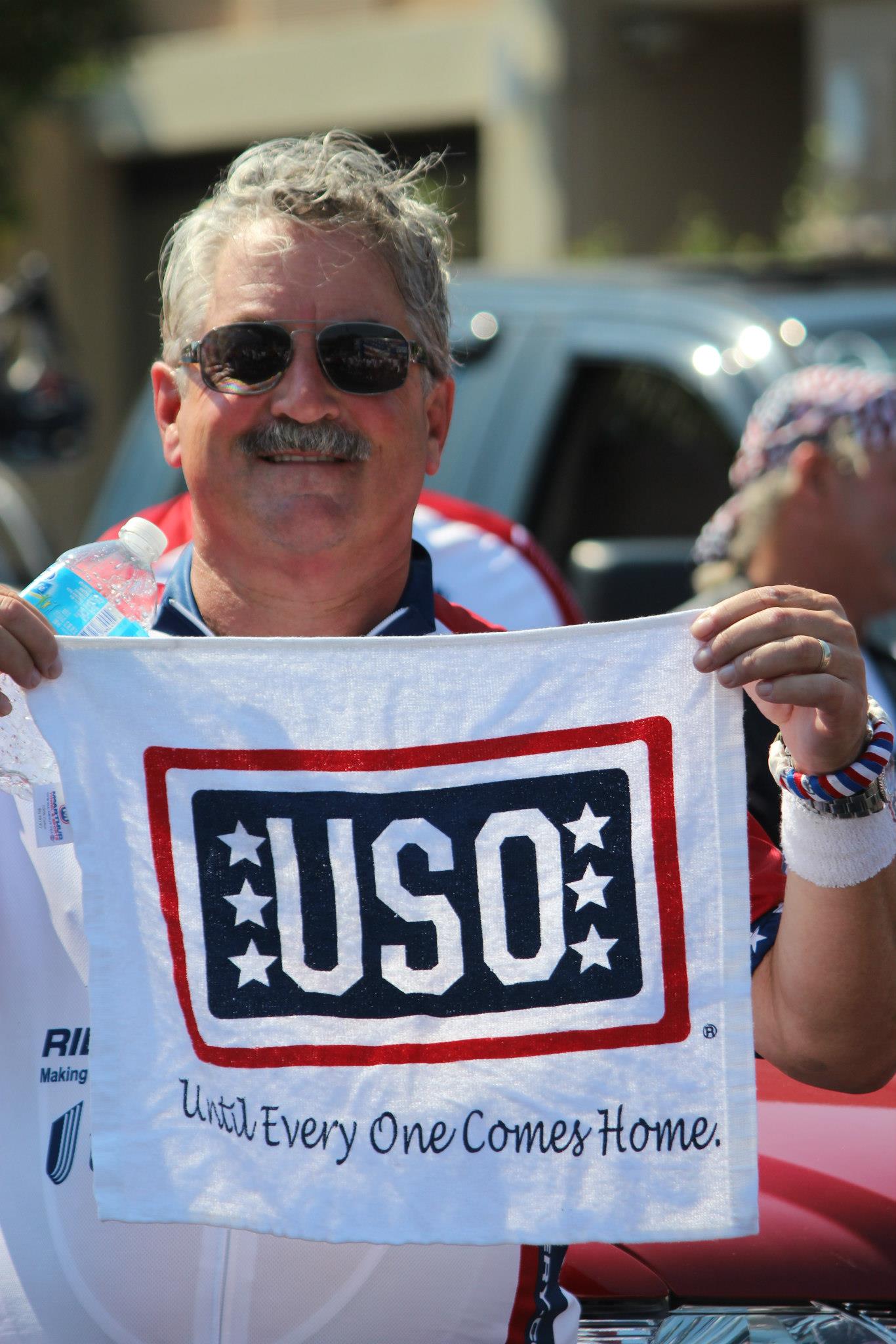 Rob holding USO flag.jpg