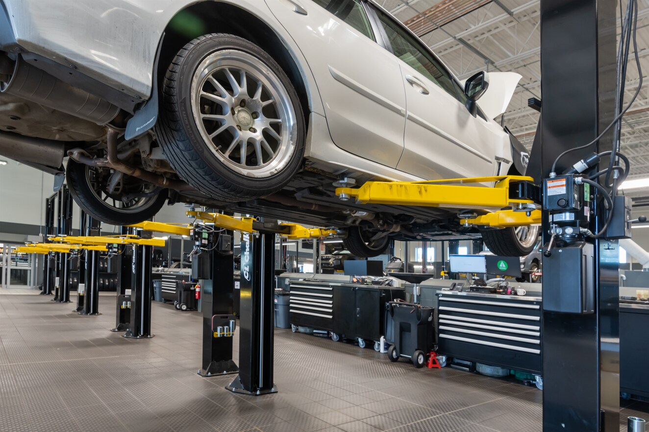 Car on lift.png Vehicle Lift in our Subaru Tire Shop