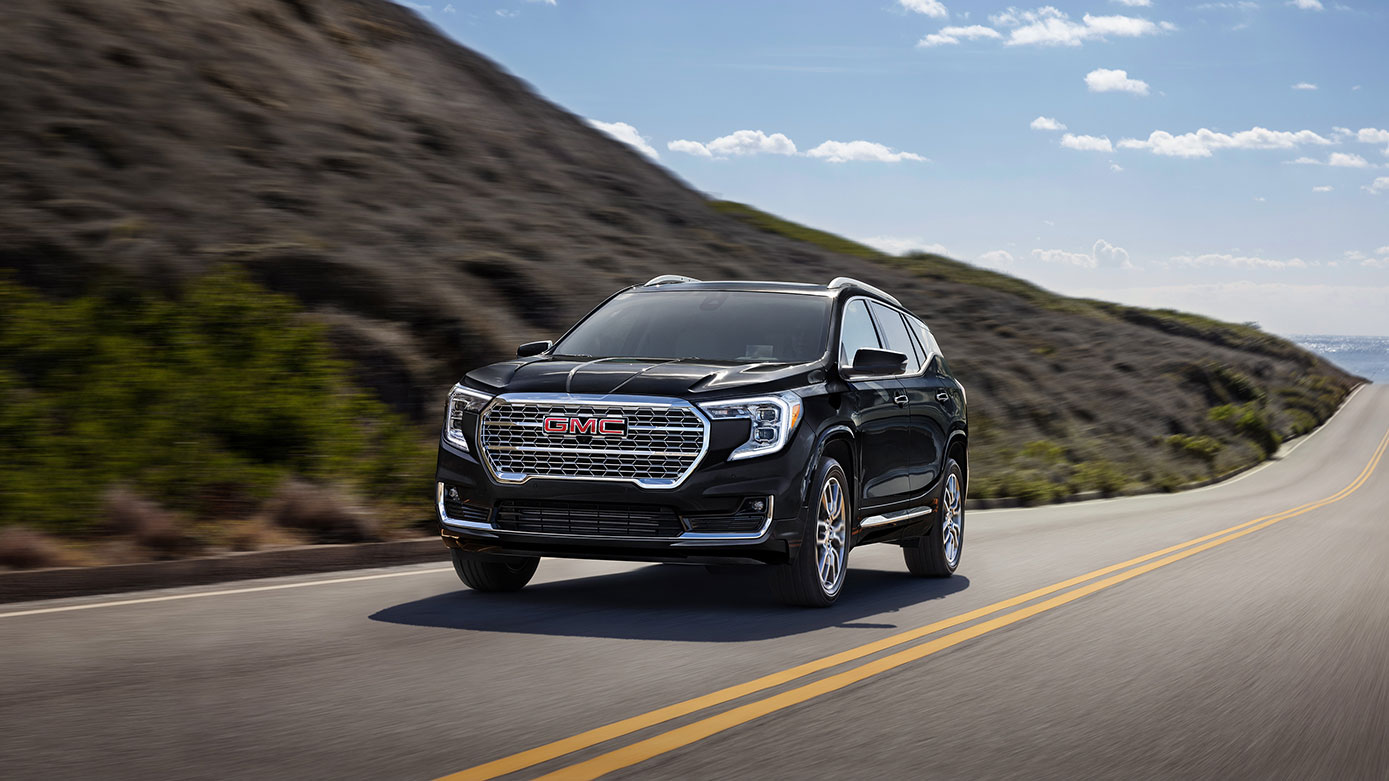 black GMC Terrain driving on highway