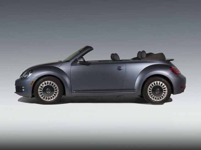 2016 VW Beetle Convertible silver blue facing left.jpg