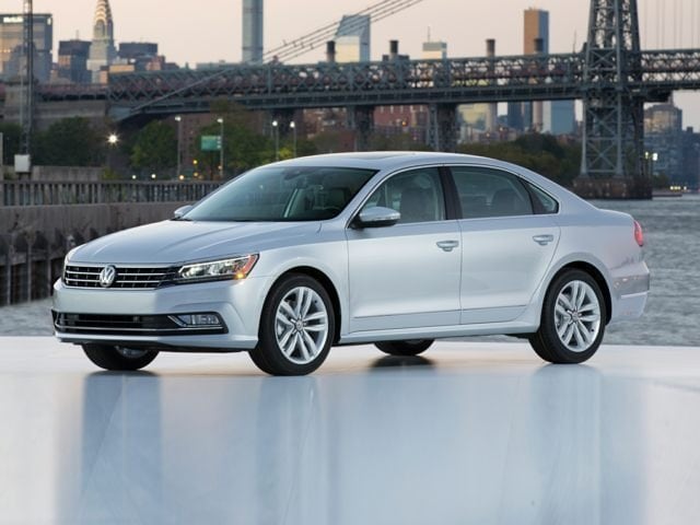 2017 Volkswagen Passat sedan bluish silver on ice with bridge in background.jpg