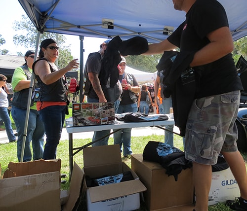 Photo of Ferman employees giving complimentary t-shirts at the 2016 Cotee River Bikefest
photo of Ferman Volvo handing out complimentary t-shirts at a local Cotee River Bikefest