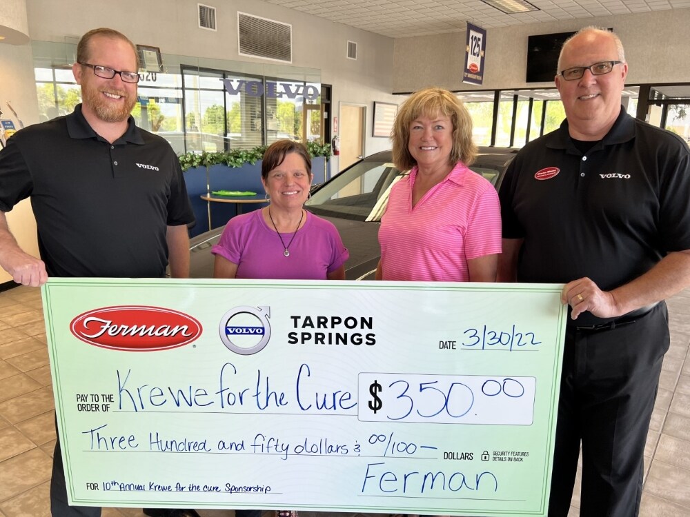 Ferman Volvo Cars of Tarpon Springs donating check to Cancer Charity