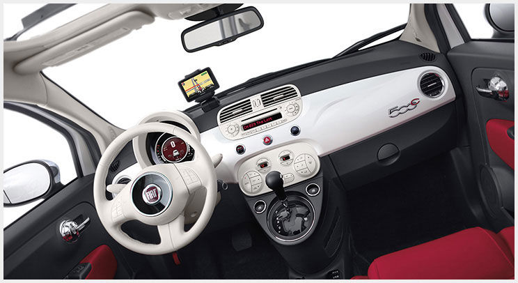 2015 FIAT 500c Interior in White.jpg White and red interior of a 2015 FIAT 500c with the top retracted