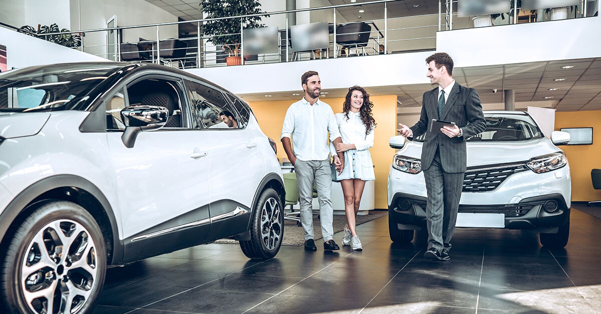 General_Dealership_Customer-SalesRep-Talking_2_1200x628.jpg dealership sales rep
