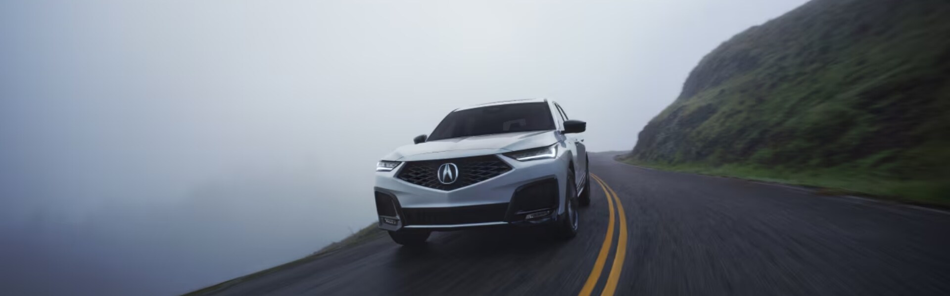 Acura MDX on foggy road