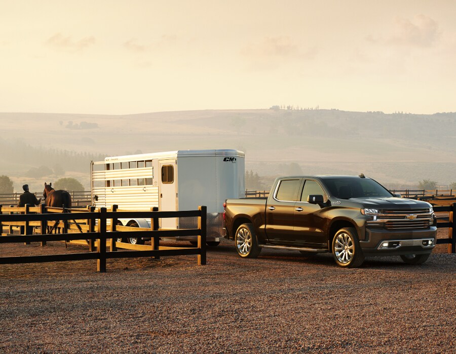 2021-Chevrolet-Silverado1500-HighCountry-CrewCab Chevy Silverado towing a trailer