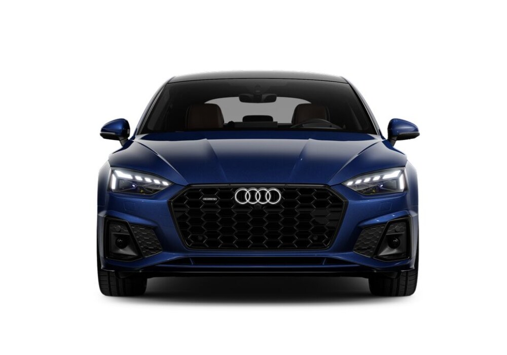 2024-audi-a5.png Stock image of a 2024 Audi A5 Sportback from a front facing angle. The Audi logo is visible on the front of the grille