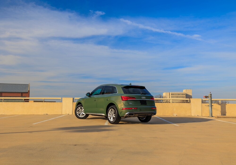 audi-q5-for-sale.png Rear exterior photo of a new Audi Q5 for sale in Greensboro. The SUV is parked facing away from the camera