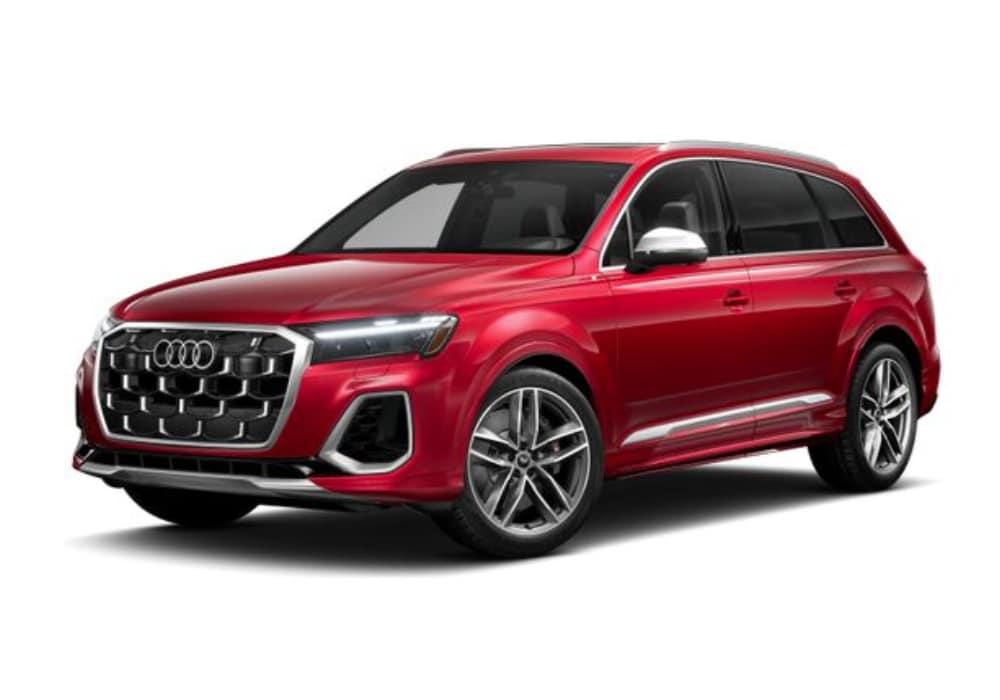 2024-audi-sq7.png A red 2025 Audi SQ7 SUV for sale in Greensboro. The SUV has black wheels, chrome accents, and a black grille with the Audi logo