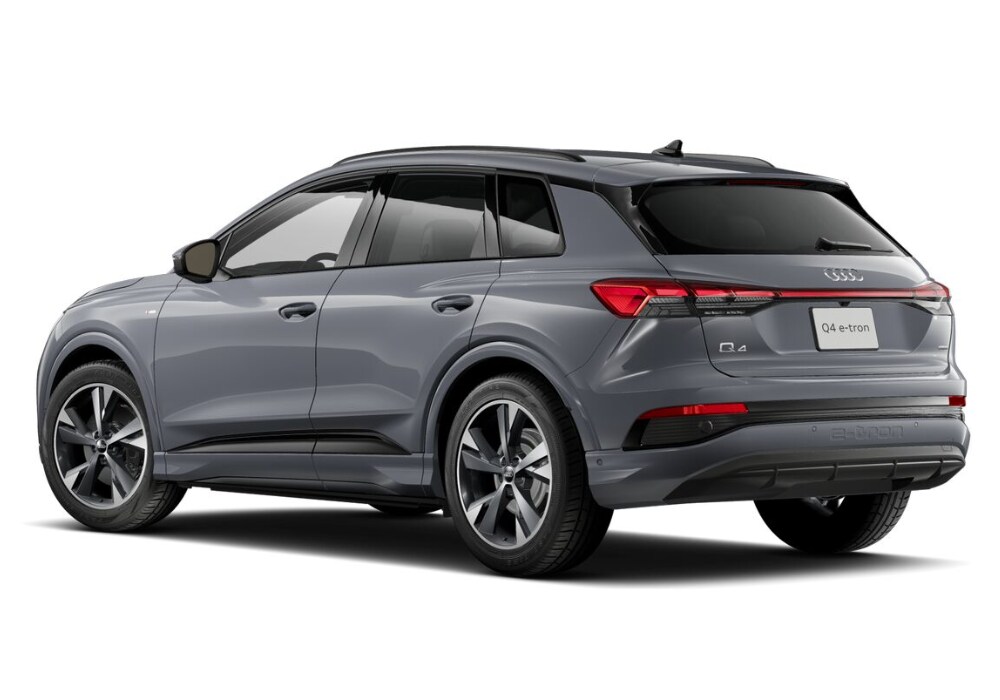 stock photo from the back left angle of a new 2024 Audi Q4 e-tron SUV