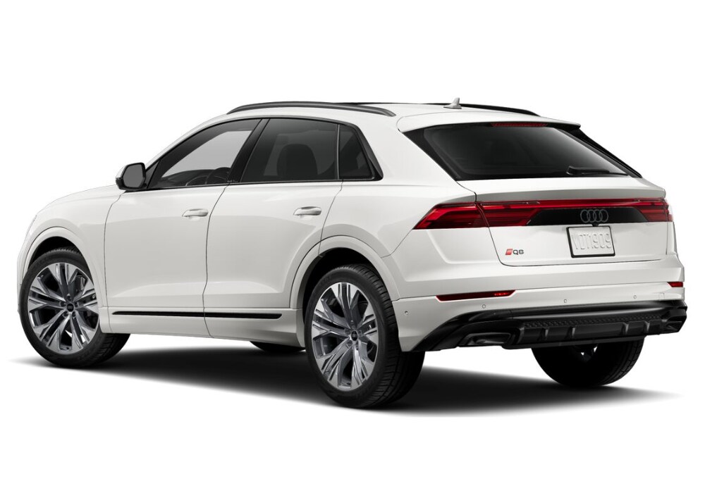 audi-q8-suv.png new 2024 Audi A8 for sale in Winston-Salem. In the photo, the vehicle is facing away from the camera and the back bumper and Audi Q8 logo are visible