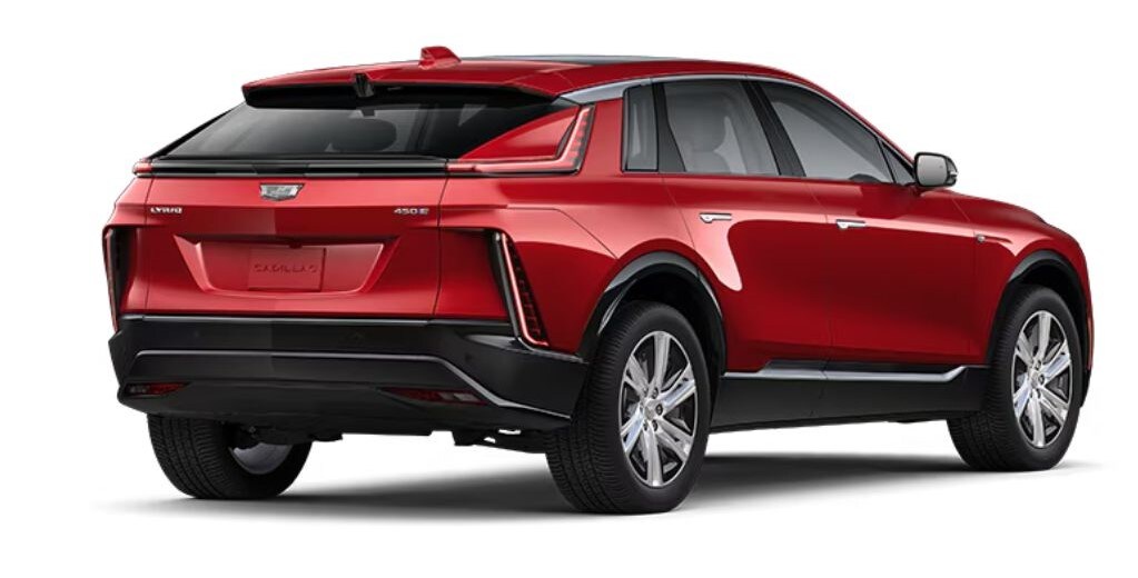 Rear side view of 2024 Cadillac Lyriq for sale in Wilmington, NC, shown in Radiant Red Tintcoat