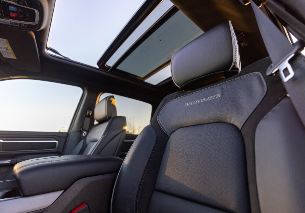2025-ram-1500-lamarie-interior.png Front seats of the 2025 Ram 1500 Laramie for sale in Charlottesville