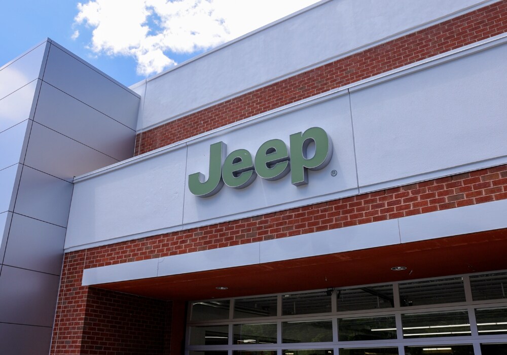 jeep-dealership-charlottesville-va.png The Jeep logo affixed to the front of the Flow Chrysler Dodge Jeep Ram of Charlottesville automotive dealership
