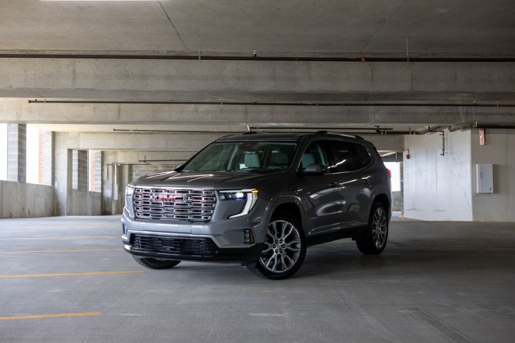 gmc-acadia-denali-greensboro-nc.jpg front shot of a black 2024 GMC Acadia Denali parked in a parking garage at Flow Buick GMC Greensboro