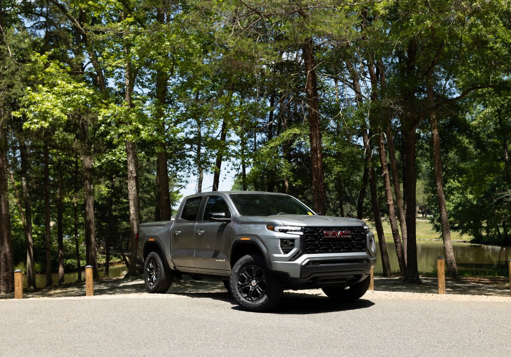 gmc-canyon-2024-for-sale-greensboro.png 2024 GMC Canyon Pickup truck in a parking lot in Greensboro, NC