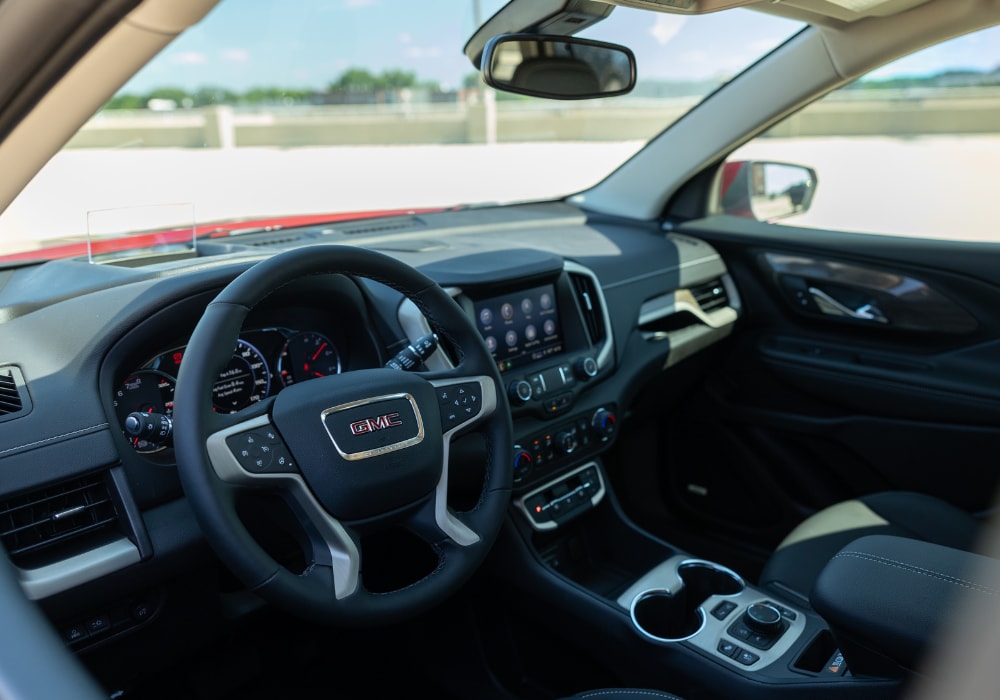 gmc-terrain-intenrior-2024.png Driver's side photo of the interior and dashboard of the 2024 GMC Terrain