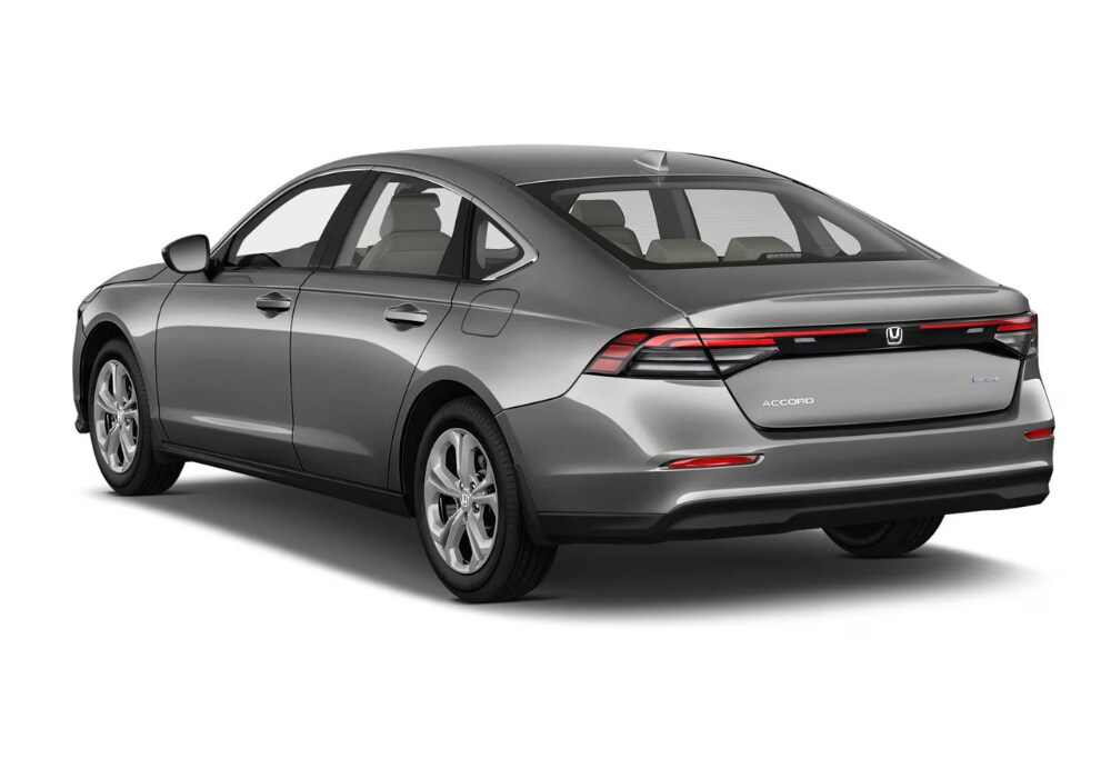 honda-accord-hybrid-for-sale.png Rear exterior photo showing the back of a 2024 Honda Accord Hybrid. The Honda logo is visible between the two taillights