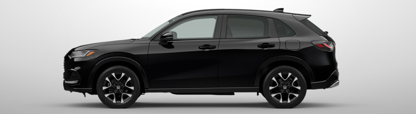 Exterior side view of a 2027 HR-V in x parked agaisnt a light gray background
