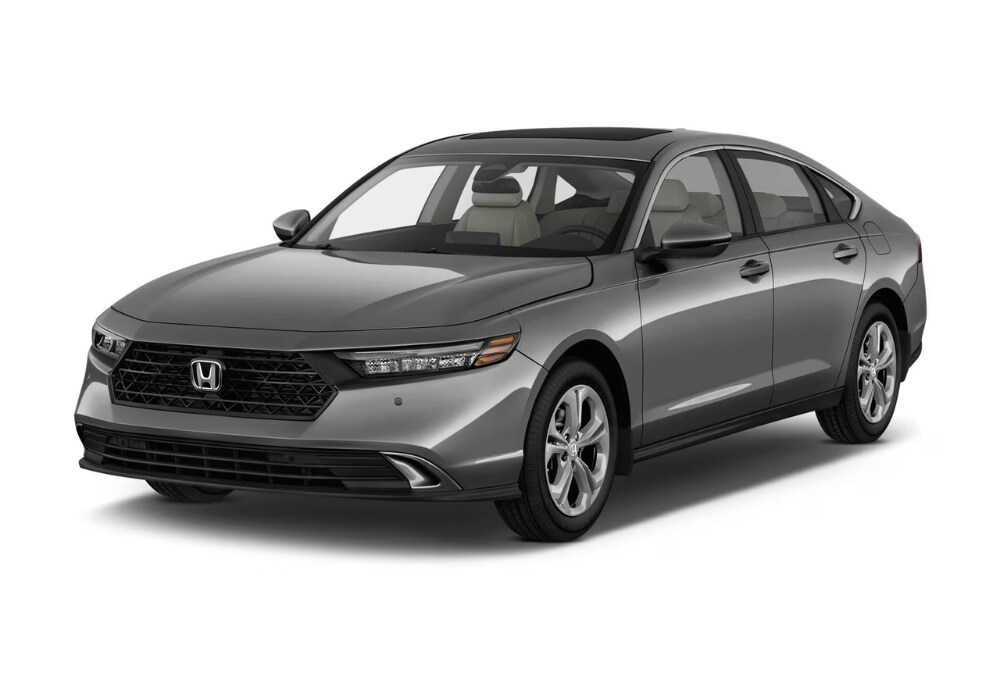 2024-honda-accord-hybrid.png Gray Honda Accord Hybrid in front of a white background. The Honda logo is visible on the front grille of the car