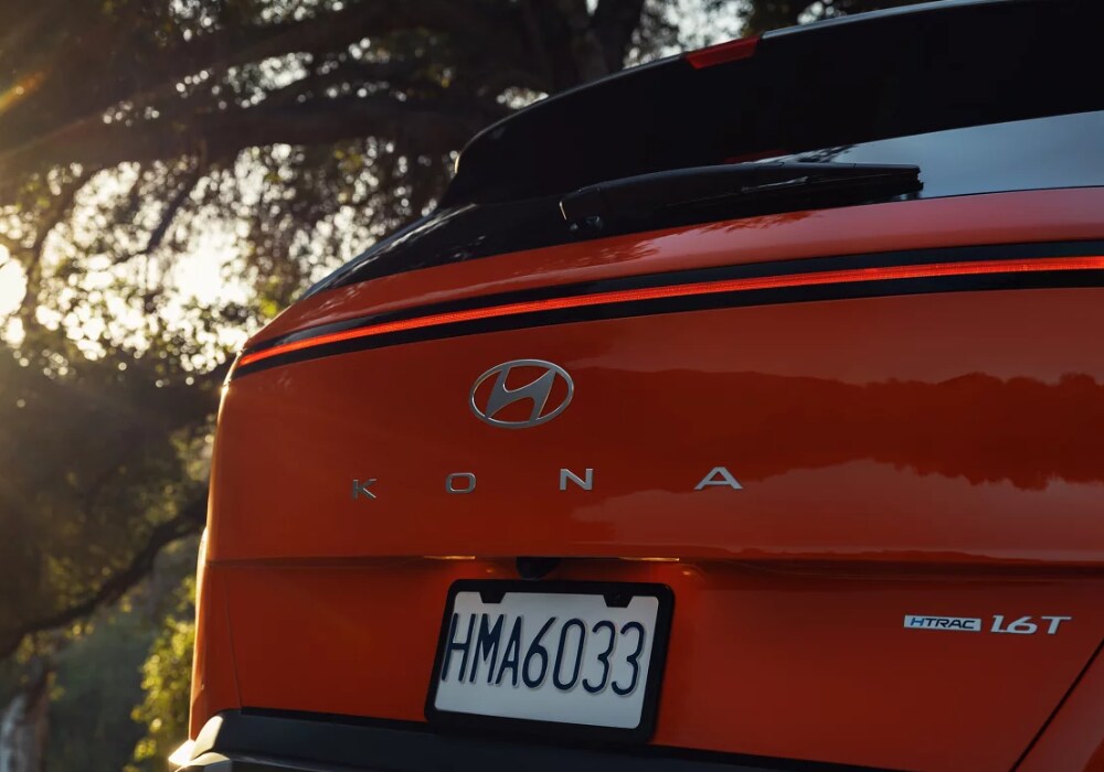 2024-hyundai-kona-suv.png Rear close up shot of the back of a Hyundai Kona, with the Hyundai logo visible