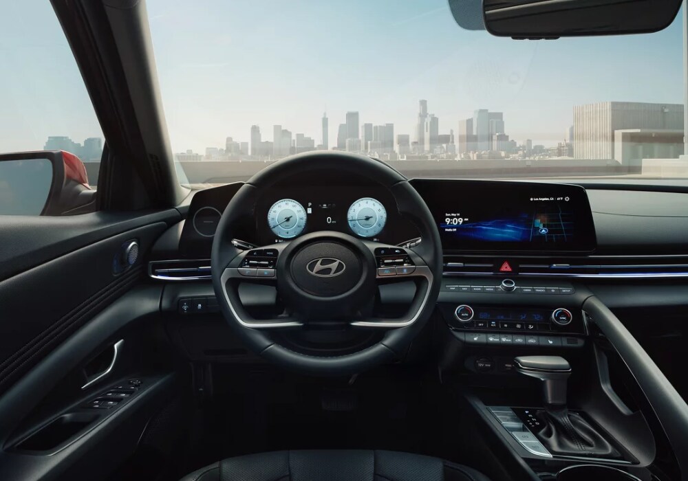 hyundai-elantra-interior.png 2024 Hyundai Elantra interior with infotainment center lit up in the center dash