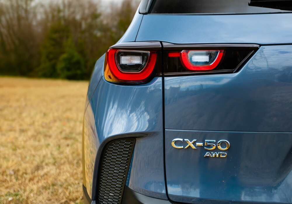 mazda-cx50-lease-greensboro.png Close up photo of the back of a Mazda CX-50 Hybrid