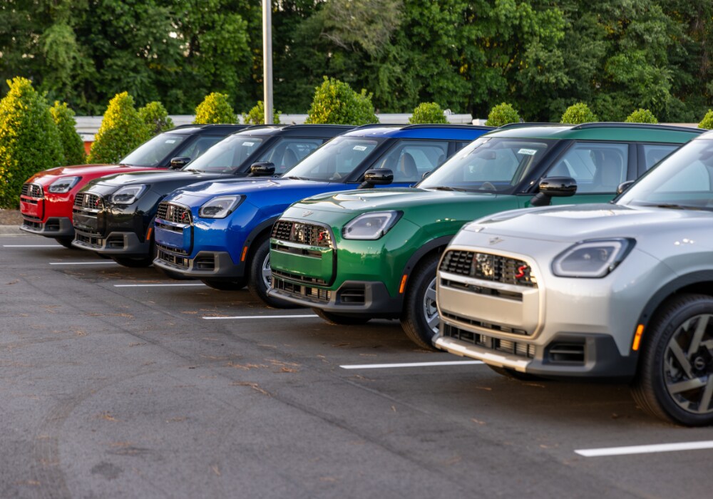 mini-demo-vehicles-raleigh-nc.png MINI cars for sale parked in the Flow MINI of Raleigh dealership