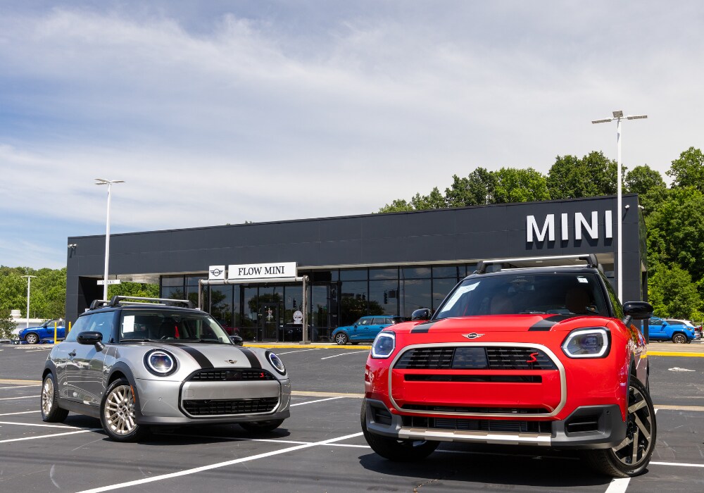 mini-demo-vehicles-winston-salem-nc.png MINI vehicles for sale parked outside the Flow MINI dealership in Winston-Salem, NC
