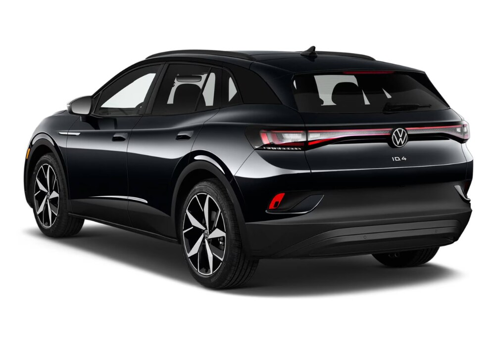 2024-vw-id-4.png Stock photo of a 2024 VW ID.4 taken from a back left angle. Volkswagen logo is visible on the back of the car