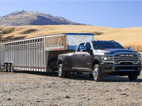 2025 RAM 3500 towing a trailer