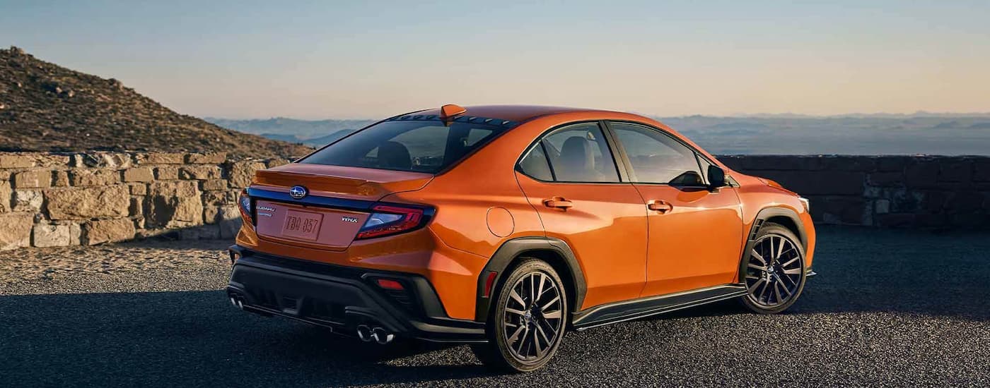 2022 Subaru WRX Limited - Orange Rear.jpg An orange 2022 Subaru WRX is shown from the rear overlooking a mountain view.