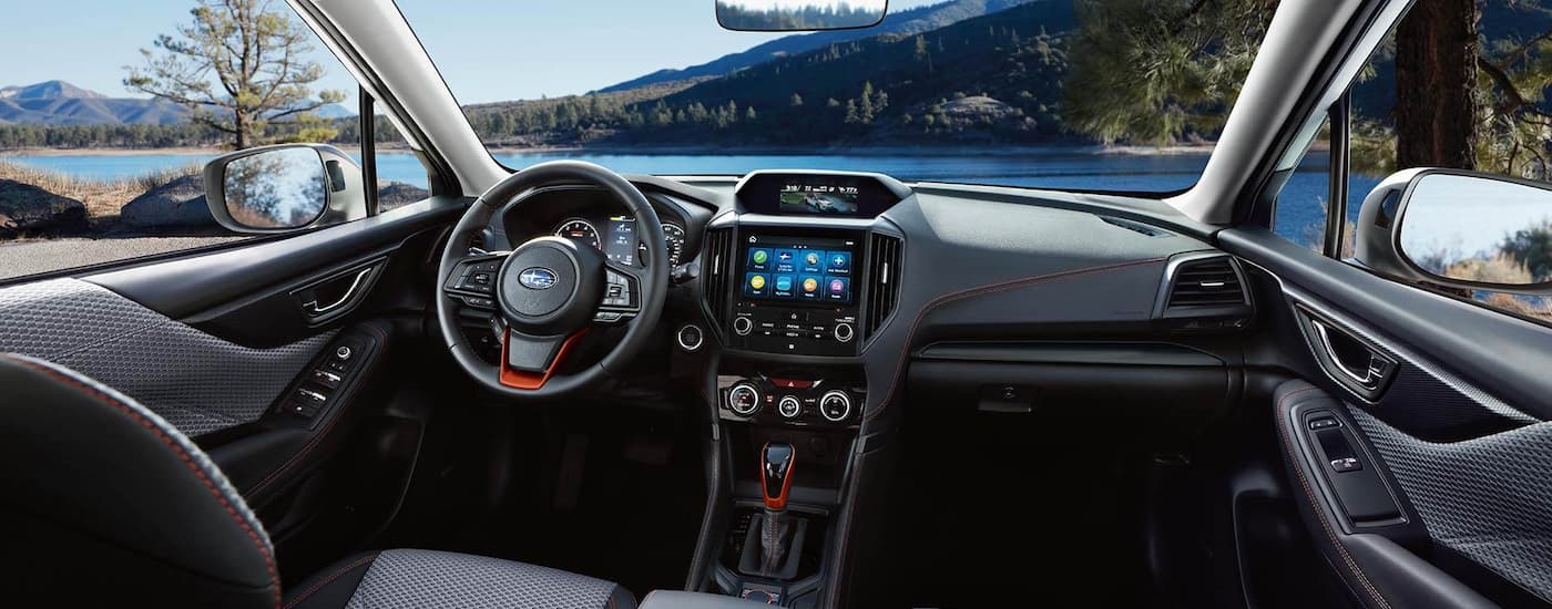 2022 Subaru Forester - Lake.jpg The front dash and interior in a 2022 Subaru Forester is shown overlooking a lake.
