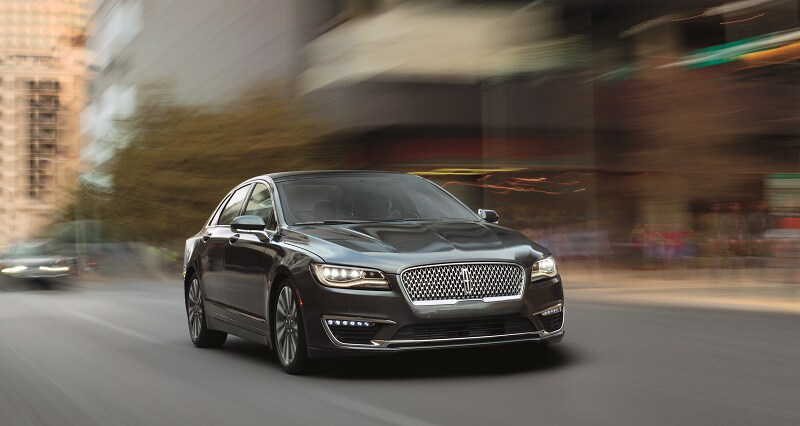 2019_Lincoln_MKZ_34FrntPassMotionShotCity.png