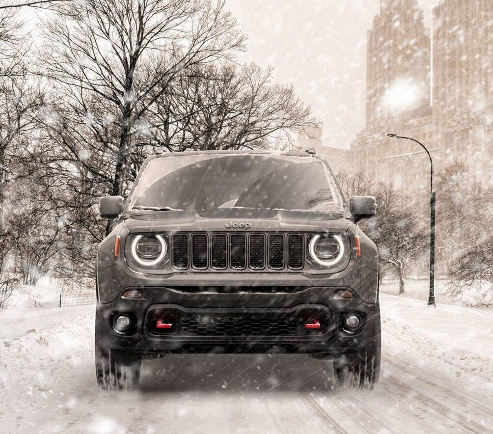 2020 Jeep Renegade driving in the snow