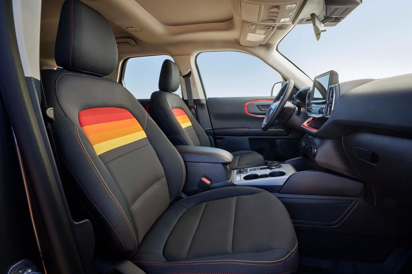 Interior of 2024 Ford Bronco® Sport Free Wheeling™ with ombre stitching and sunset weave cloth seats